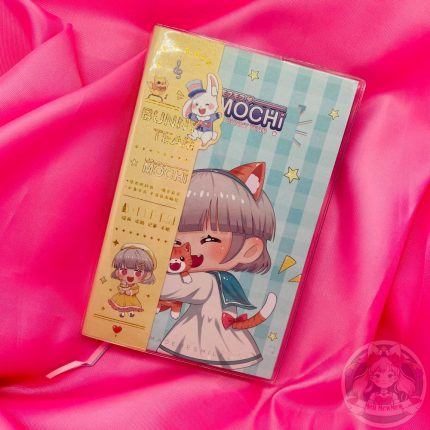 Cuaderno Bunni Team, modelo 4. Tapa de color verde con dibujo de una chica kawaii abrazando a un gato.